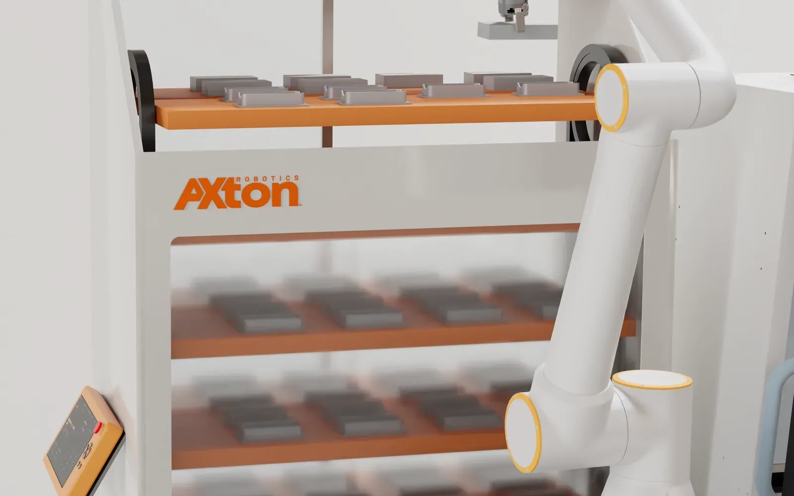 Front of the Axton Robotics carousel machine tending station with its cobot arm and shelves of parts